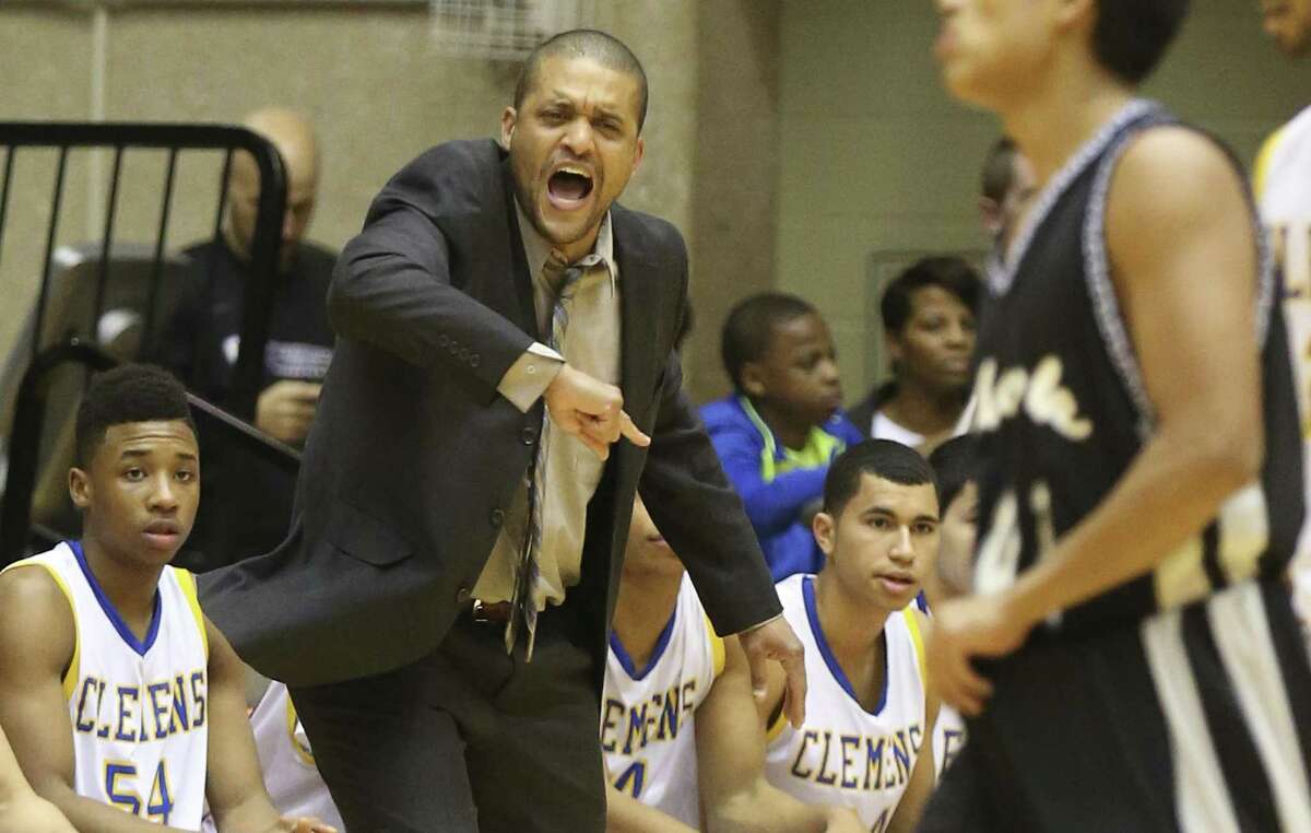 Clemens coach Clifton Ellis directs his team against Clark in Region IV quarterfinals at the UTSA Convocation Center in 2015.