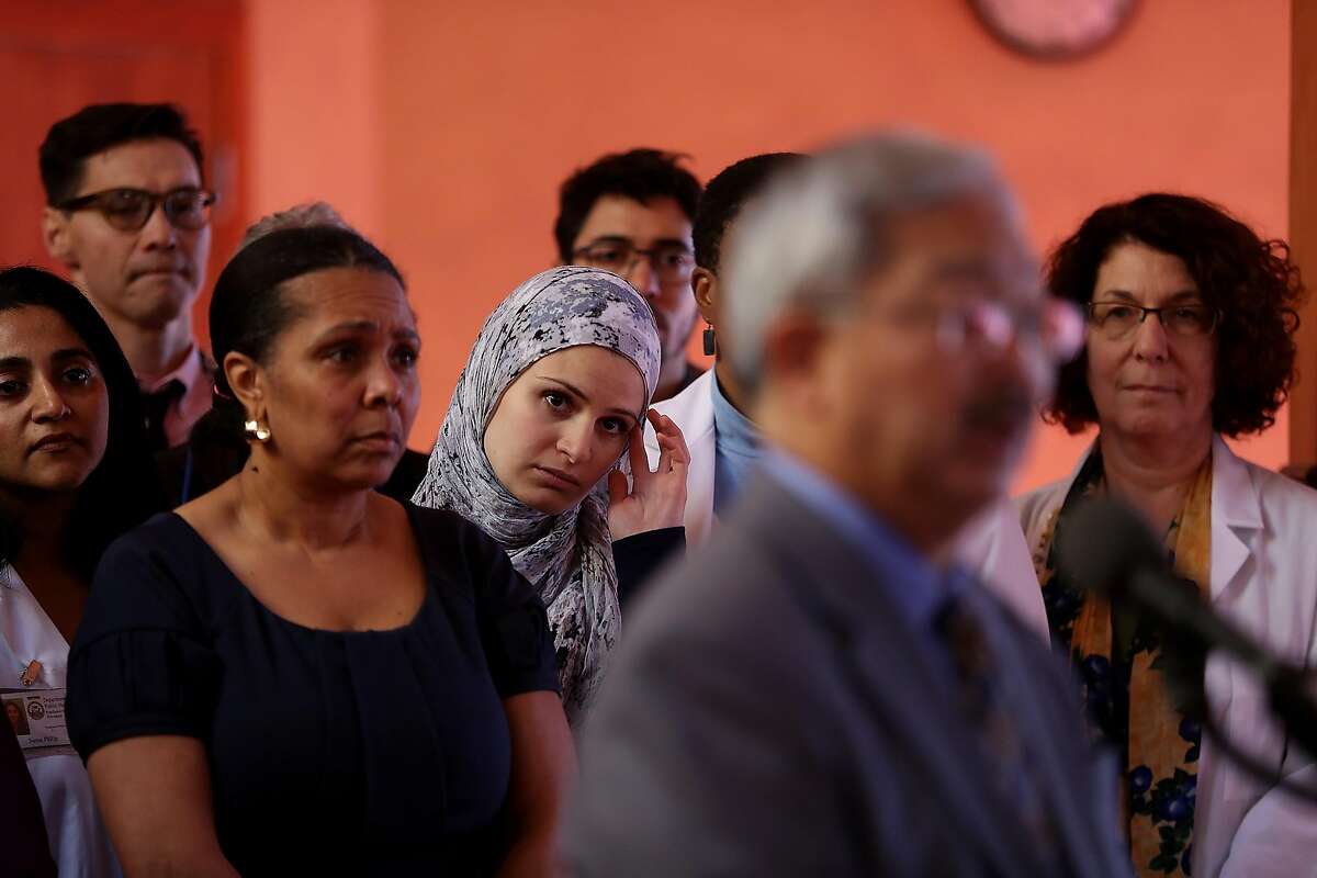SAN FRANCISCO, CA - JANUARY 13: Attendees look on as San Francisco Mayor Ed Lee speaks during a news conference at the Islamic Society of San Francisco on January 13, 2017 in San Francisco, California. Lee announced the launch of the Equity and Immigrant Services campaign that will provide support for immigration related legal services. (Photo by Justin Sullivan/Getty Images)
