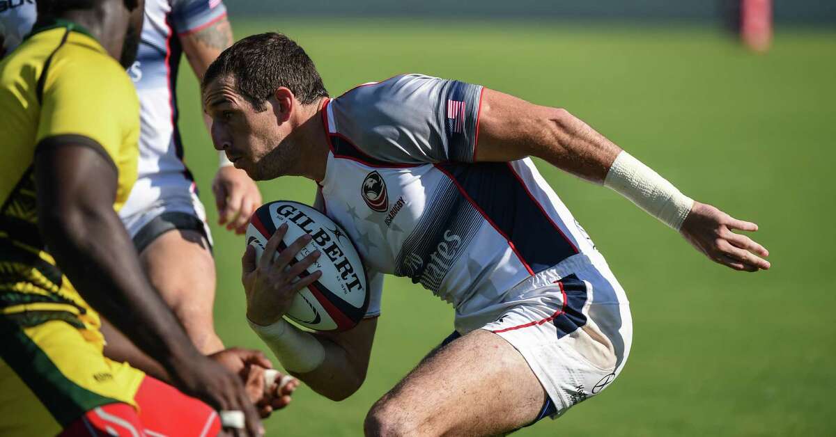 Zacl Test carries the ball for the USA Eagles rugby team in a 2015 match against Jamaica in Cary, N.C.