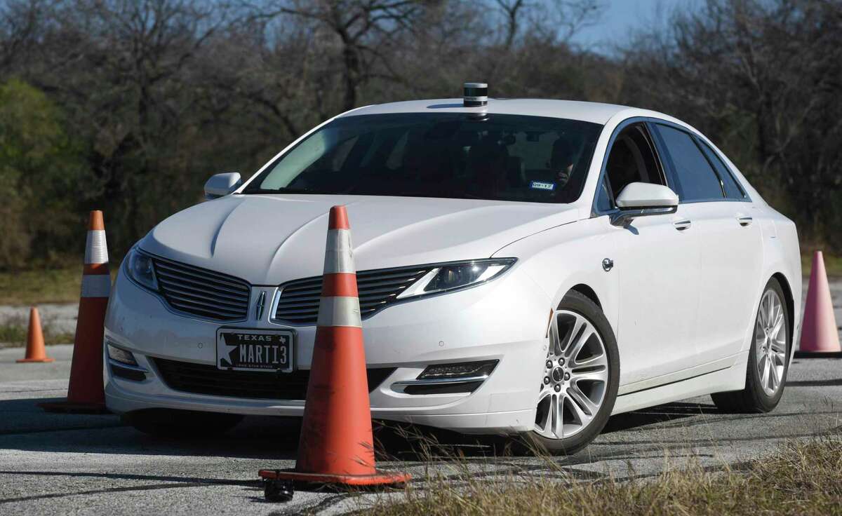 An autonomous Lincoln MKZ hybrid navigates a course on Tuesday, Jan. 31, 2017 at the Southwest Research Institute in San Antonio.
