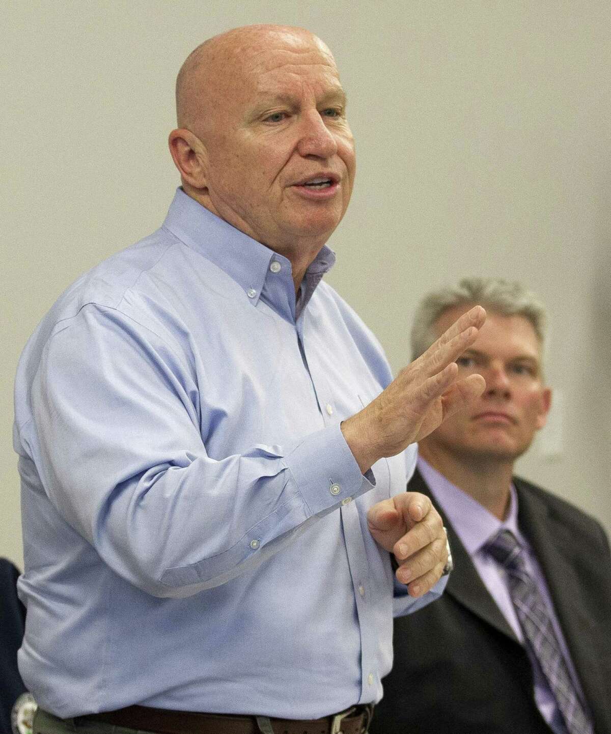 House Ways and Means Committee Chairman Rep. Kevin Brady, R-The Woodlands, addresses business leaders' concerns about repealing and replacing the Affordable Care Act as J.J. Hollie, president of The Woodlands Area Chamber of Commerce, looks on at The Woodlands Area Chamber of Commerce Tuesday, Jan. 17, 2017, in The Woodlands.