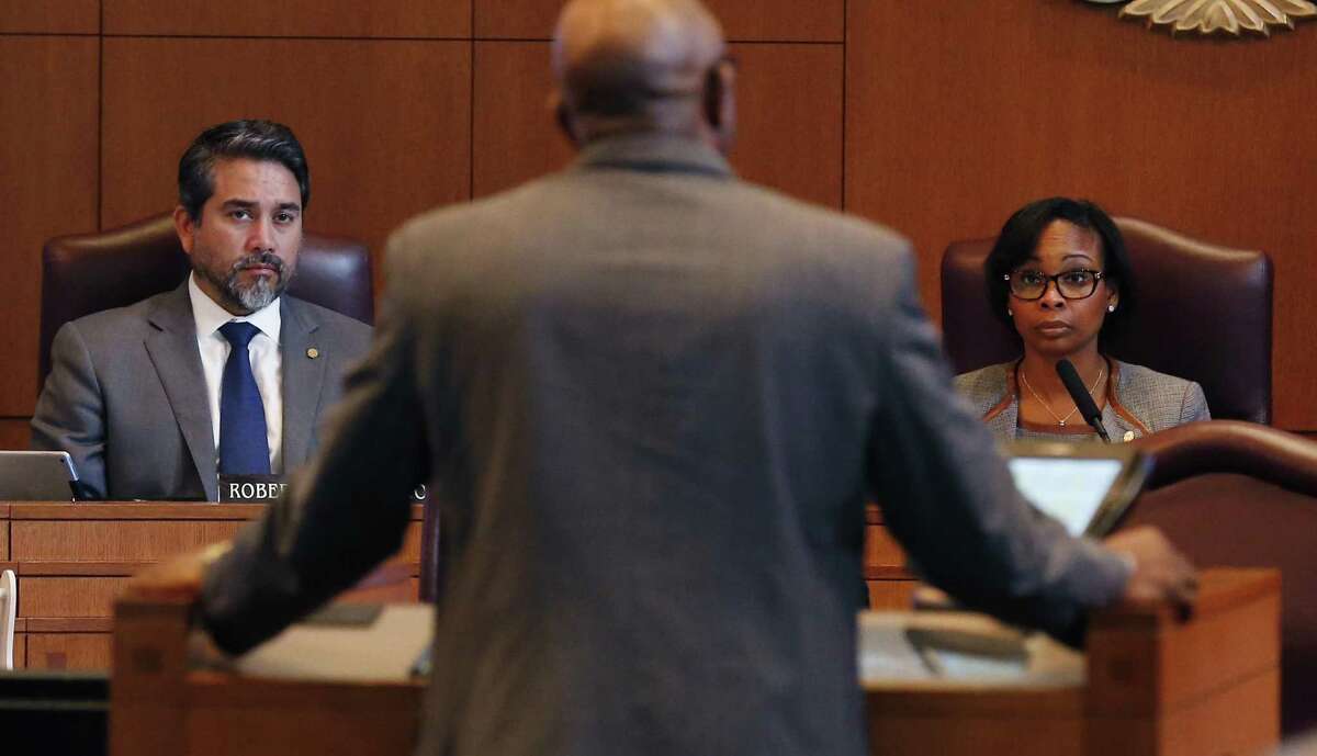 Mayor Ivy Taylor (right) and District 1 Councilman Robert Trevino (left) listen to citizens before the City Council votes on an agreement between Hemisfair Park Area Redevelopment Corporation and ZH Downtown Development Company - an affiliate of Zachary Hospitality on Thursday, Feb. 2, 2017. Council faced some opposing voices and concerns from citizens regarding alleged contributions to council members and Mayor Taylor from Zachary along with opposition from Unite Here! San Antonio whom were arguing against a future hotel to be built on the Hemisfair grounds. (Kin Man Hui/San Antonio Express-News)