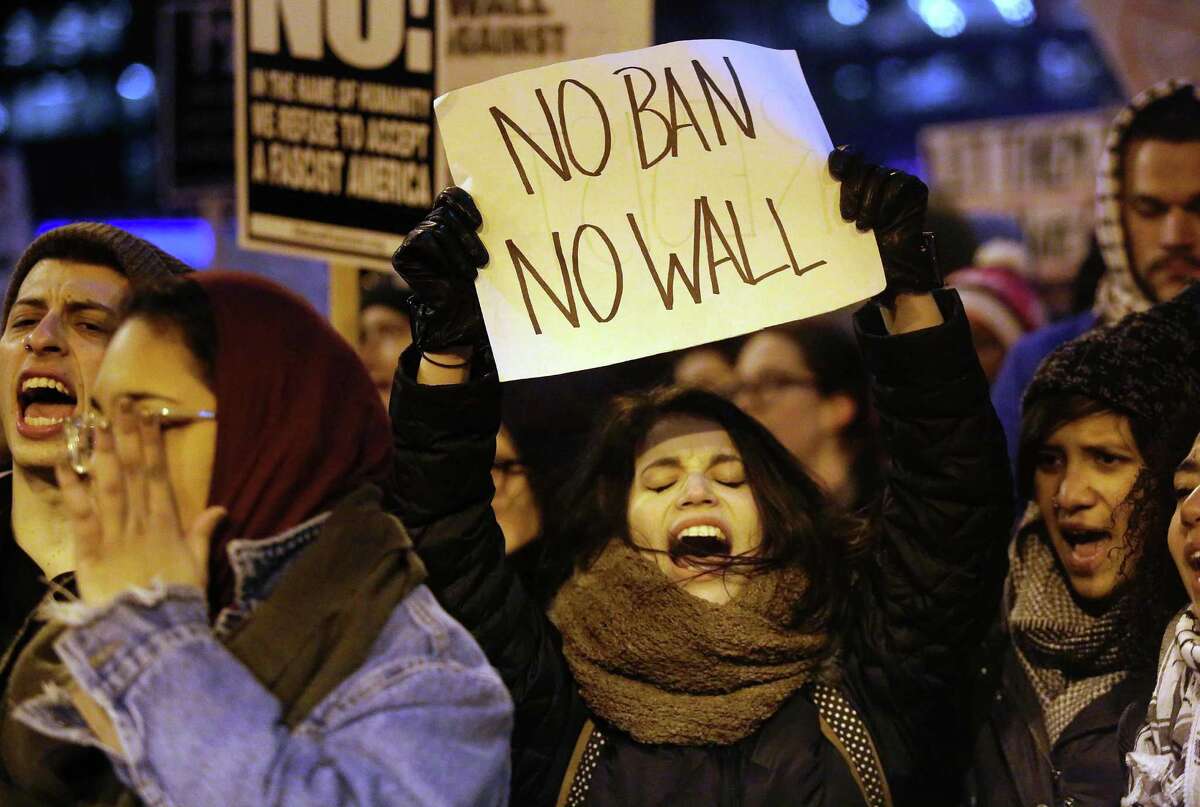 Demonstrators protest President Donald Trump’s refugee ban in Chicago last week.