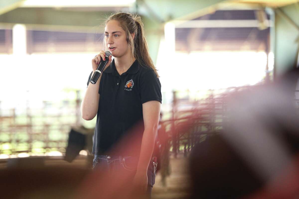Lauren Holtkamp, President of the Montgomery County 4-H Horsemanship Club, sings the National Anthem during the inaugural Special Angels Rodeo on Sunday, March 13, 2016, at the Montgomery County Fairgrounds Equestrian Center.