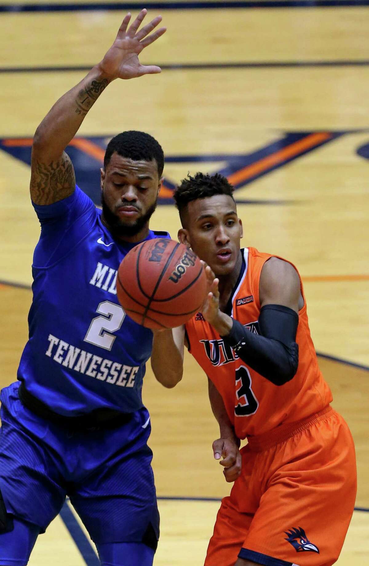 UTSA?•s Gino Littles passes around Middle Tennessee's Antwain Johnson during second half action Thursday Feb. 2, 2017 at the Convocation Center. Middle Tennessee won 69-59.