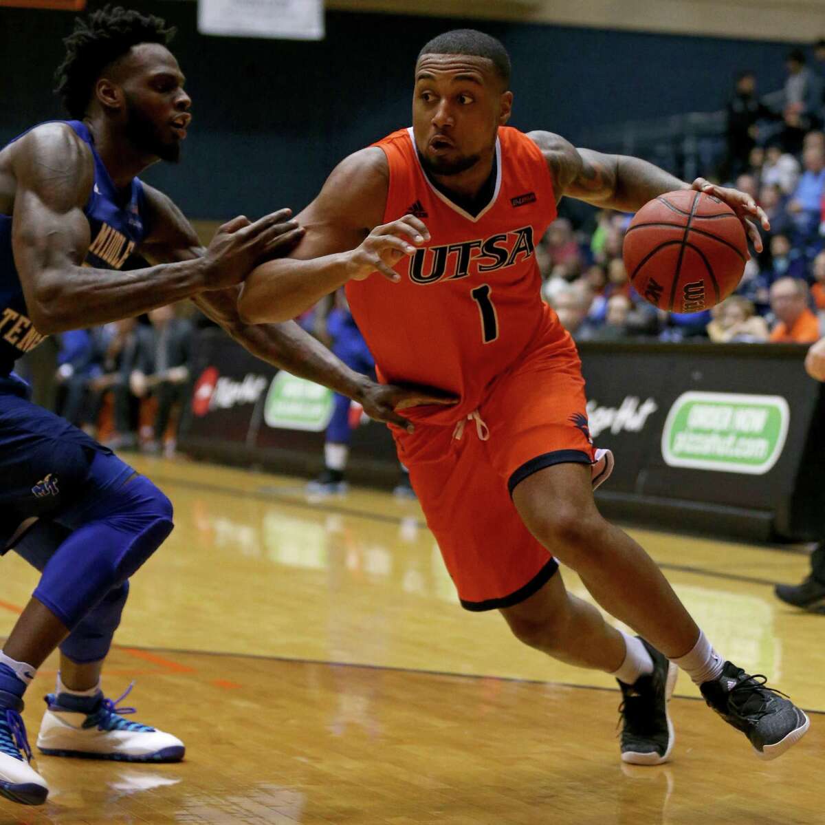 UTSA?•s Jeff Beverly drives around Middle Tennessee's JaCorey Williams during second half action Thursday Feb. 2, 2017 at the Convocation Center. Middle Tennessee won 69-59.