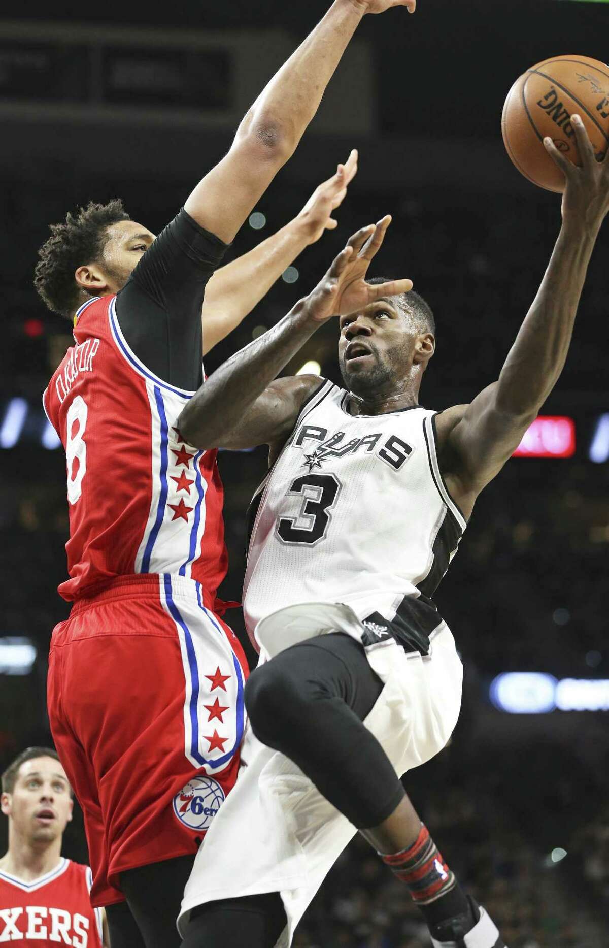 Dwayne Dedman leans up for a shot against Jahlil Okafor as the Spurs host the Sixers at the AT&T Center on February 2, 2017.