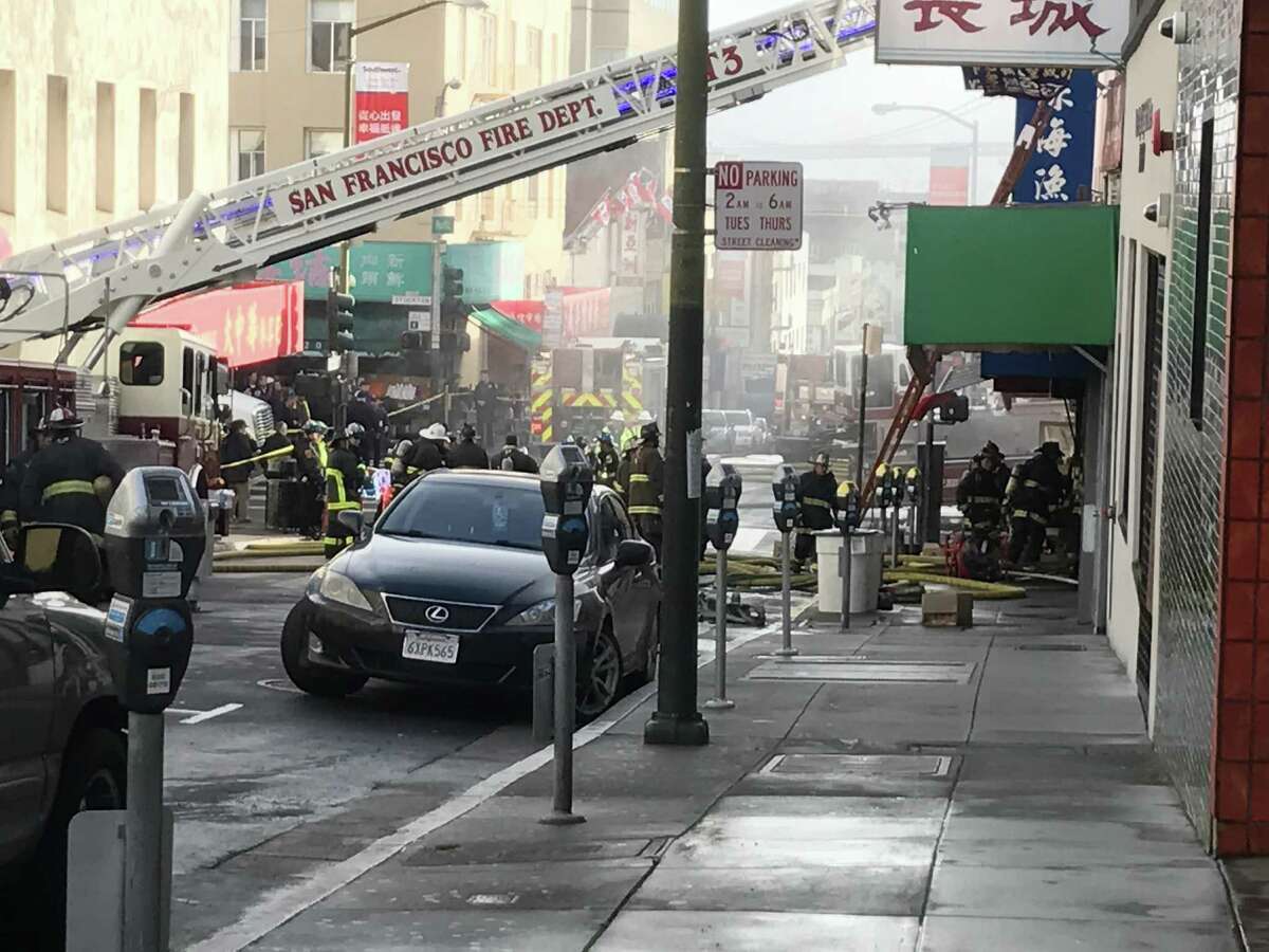 Firefighters battled a blaze in San Francisco’s Chinatown on Friday.