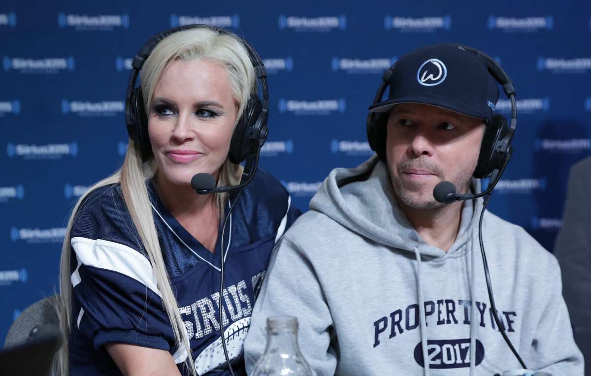 HOUSTON, TX - FEBRUARY 03: Jenny McCarthy, left, hosts a special edition of her SiriusXM show, The Jenny McCarthy Show, live from the SiriusXM set with Donnie Wahlberg at Super Bowl LI Radio Row at the George R. Brown Convention Center on February 3, 2017 in Houston, Texas. (Photo by Cindy Ord/Getty Images for SiriusXM )