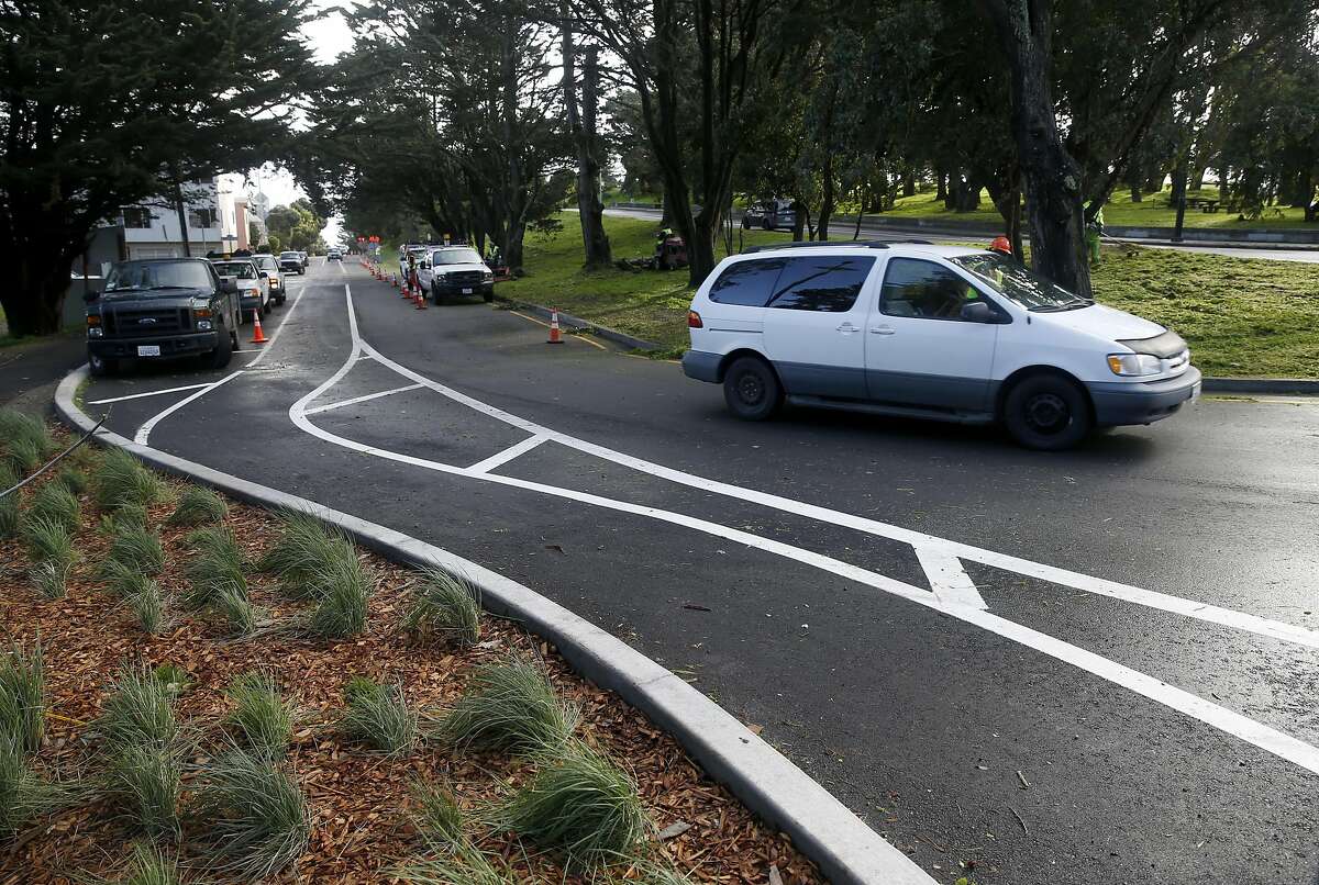 Westbound traffic on Mansell Street is diverted around a new dedicated bicycle and pedestrian path through McLaren Park in San Francisco, Calif. on Friday, Feb. 3, 2017. The new path officially opens to the public Saturday.