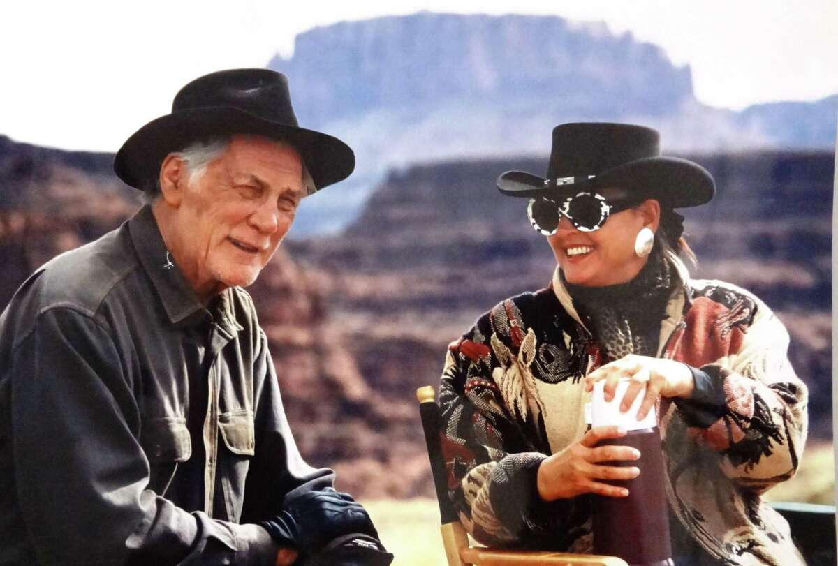 Jack Palance and wife Elaine on the set of “City Slickers 2: The Legend of Curly’s Gold” in Moab, Utah, in 1993. Elaine: “See, I’m trying to fit into the scenery and the spirit of things; I’ve got my horse jacket on and my cow glasses.”