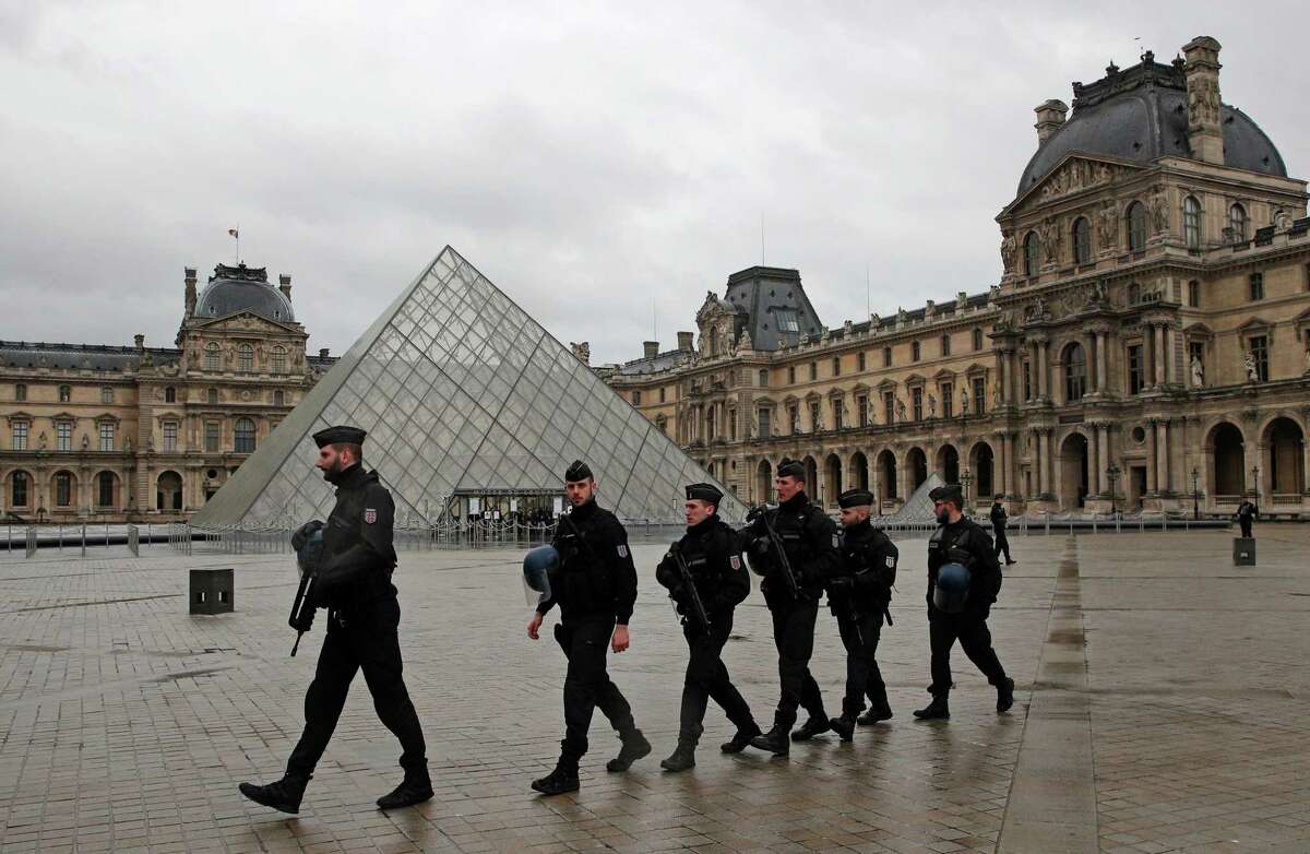 ﻿Police ﻿patrol ﻿outside the Louvre in Paris Friday near where a soldier shot an attacker. ﻿﻿﻿ The attack occurred two months after an anti-terrorism exercise there. ﻿
