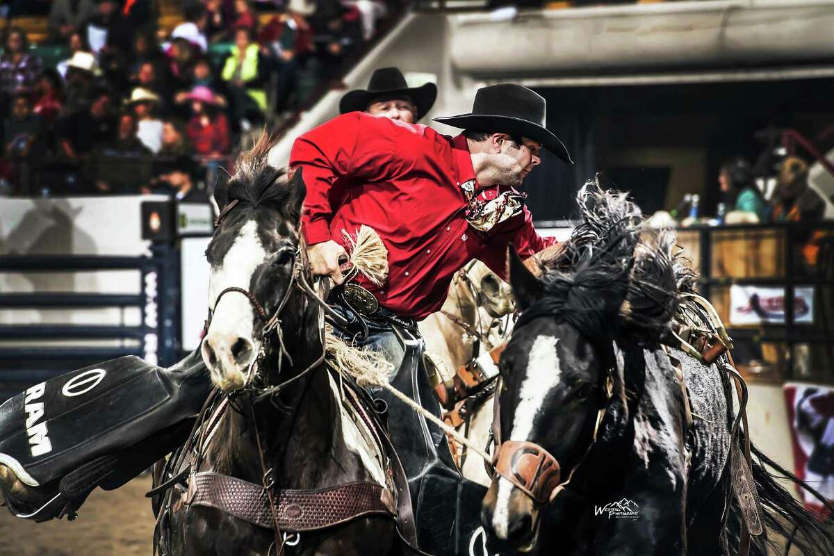 Chase Cervi, shown here in action earlier this year at the National Western Stock show in Denver, is a regular pickup man at the San Antonio Rodeo. Photo by Greg Westfall
