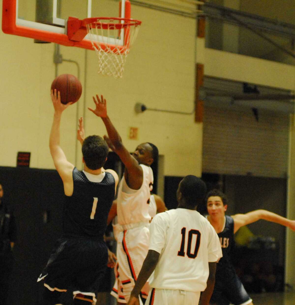 Action from Staples' 55-47 win over Stamford Friday.