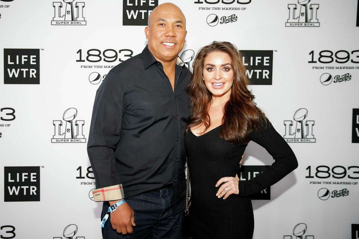 Hines Ward and his wife, Lindsey Ward, walk the red carpet before Bruno Mars performs at Club Nomadic Friday, Feb. 3, 2017 in Houston.