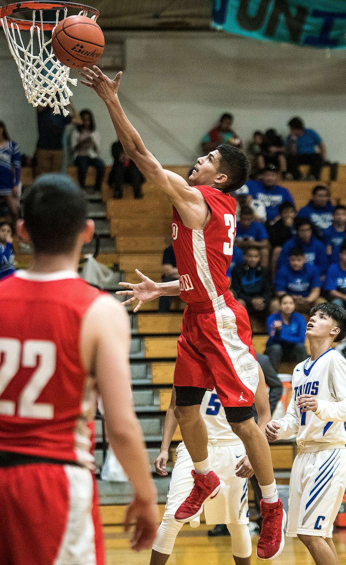 Martin’s Jesus Delgado had nine points in the opening quarter as the Tigers won 54-42 and clinched at least a share of its first district title since 2011-2012.