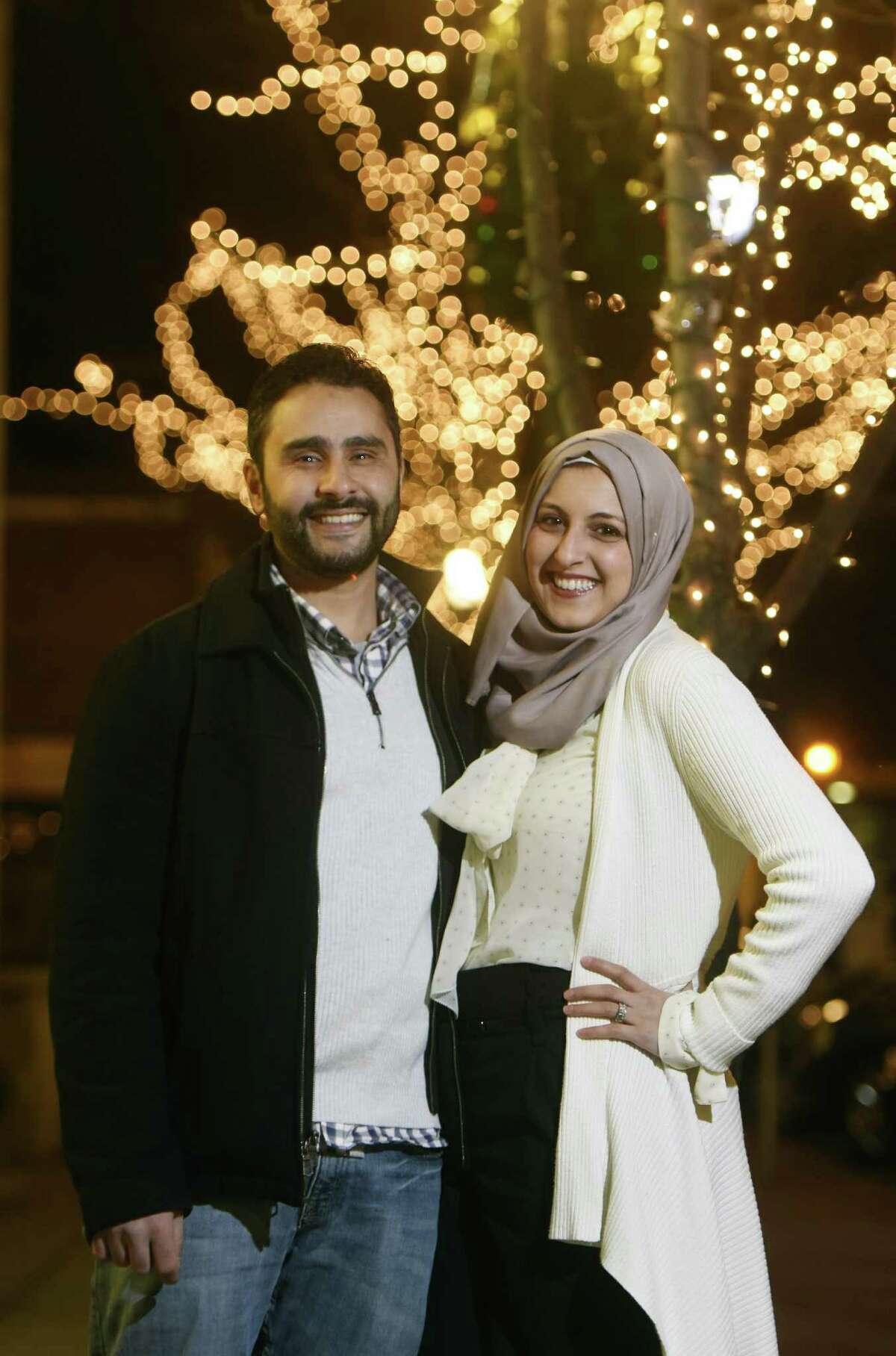 Stamford residents Shaimah Hamdan and her husband Fadi El-Ghussein pose near their home in downtown Stamford, Conn. Thursday, Jan. 19, 2017. The young couple has been living in Stamford for two years, moving to the area from New Hampshire for Fadi's job.
