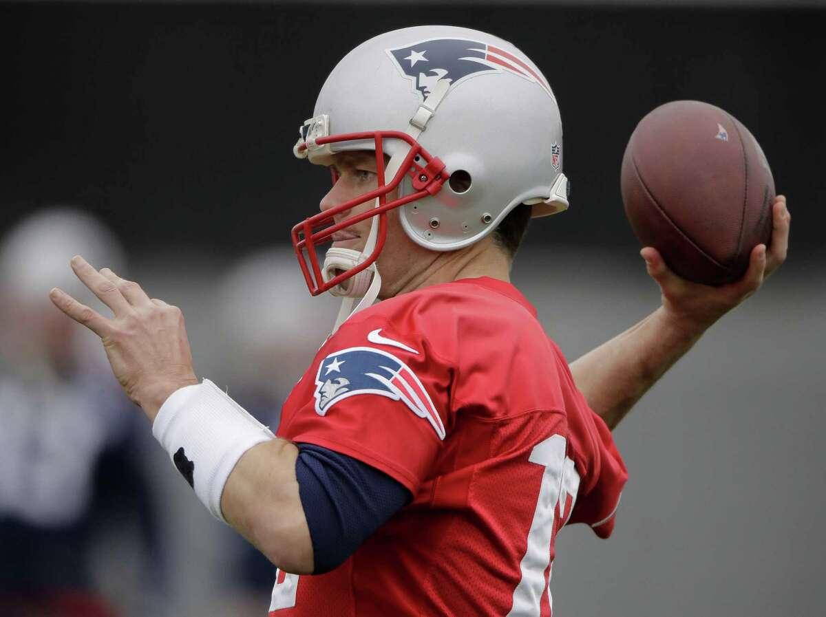 New England Patriots quarterback Tom Brady participates in a drill during practice for the NFL Super Bowl 51 football game Friday, Feb. 3, 2017, in Houston. The Patriots will face the Atlanta Falcons in the Super Bowl Sunday. (AP Photo/Charlie Riedel)