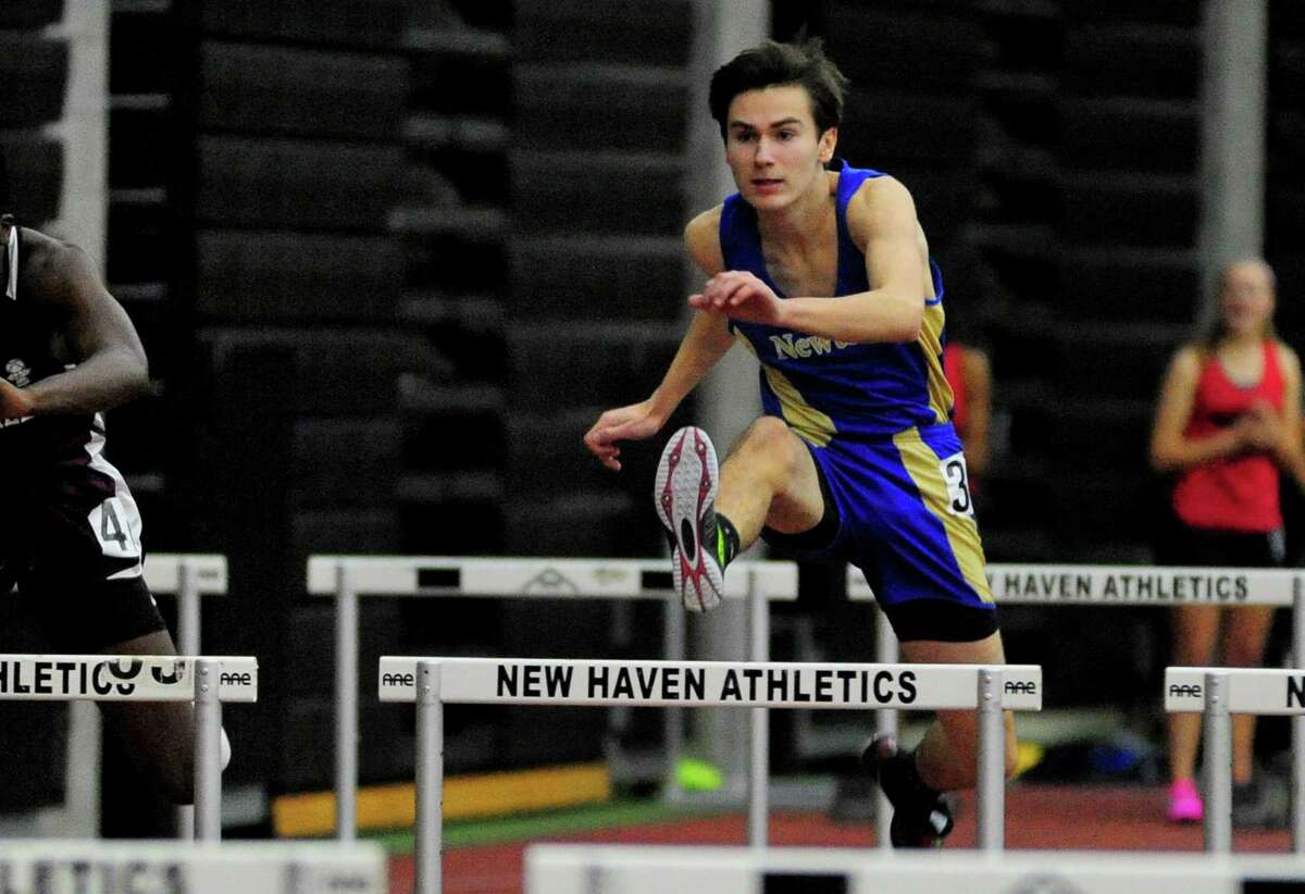 Newtown's Thomas Hartley competes in the 55 meter hurdles event during SWC Indoor Track and Field Championships in New Haven, Conn. on Saturday Feb. 4, 2017.