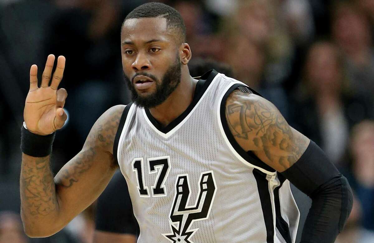 Spurs’ Jonathon Simmons reacts after making a 3-pointer during second half action against the Denver Nuggets on Feb. 4, 2017 at the AT&T Center.