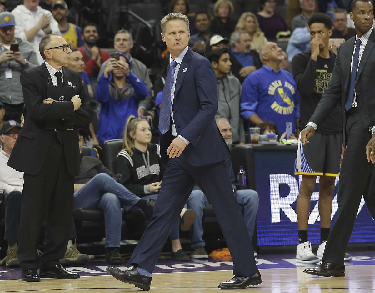 Golden State Warriors head coach Steve Kerr walks off the court after being ejected by referee Bill Spooner during the third quarter of an NBA basketball game against the Sacramento Kings, Saturday, Feb. 4, 2017, in Sacramento, Calif. The Kings won in overtime 109-106. (AP Photo/Rich Pedroncelli)