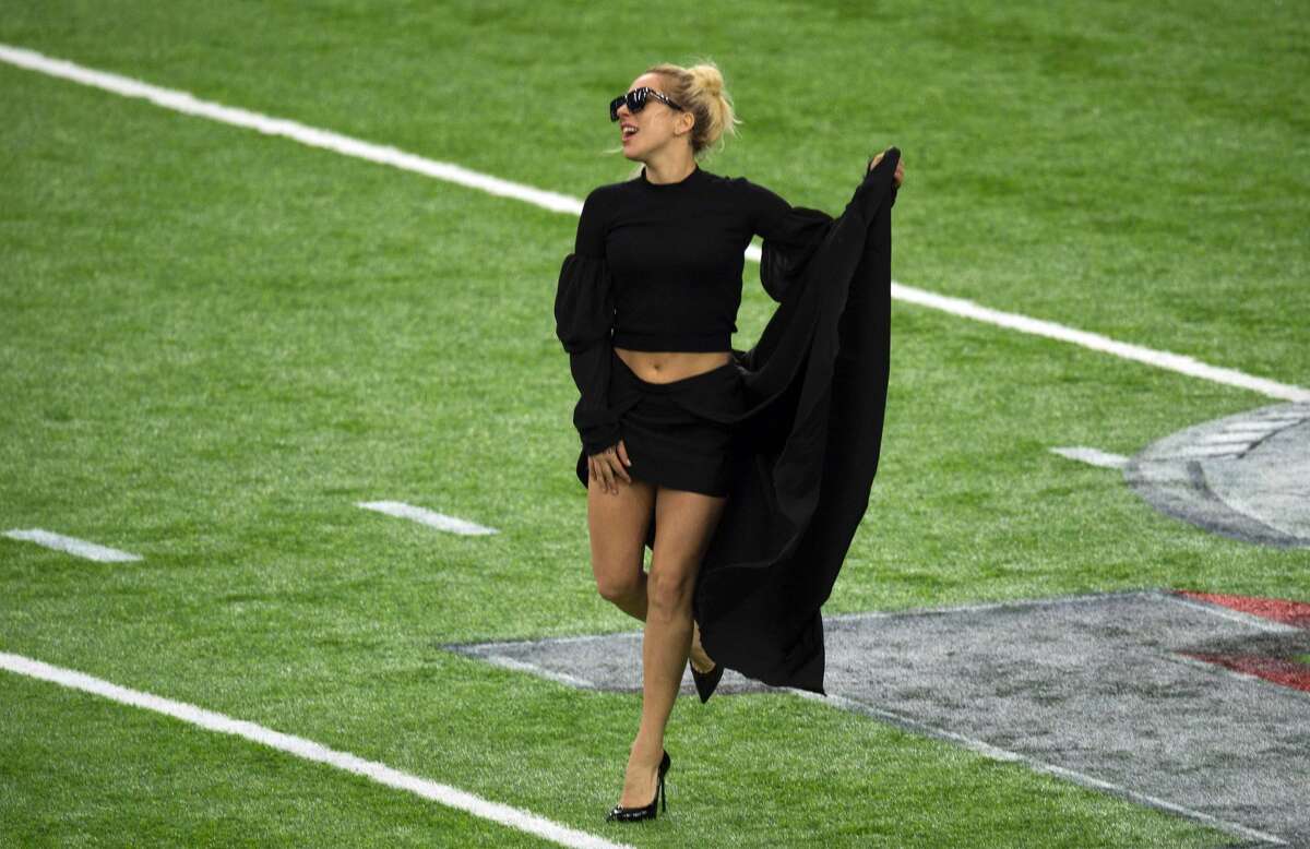 Singer Lady Gaga poses on the field at the Super Bowl LI before the start of the game at Houston NRG Stadium in Houston, Texas, on February 5, 2017. / AFP PHOTO / VALERIE MACONVALERIE MACON/AFP/Getty Images