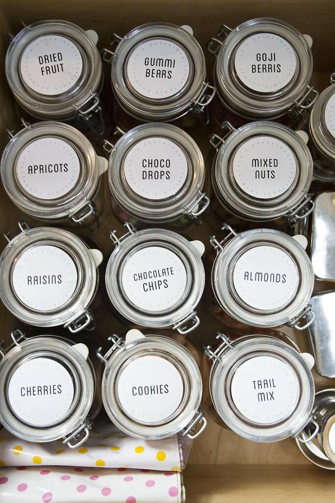 Wiebke Liu uses uniform storage jars and labels to organize her kitchen. Photo: Vivian Johnson, Special To The Chronicle