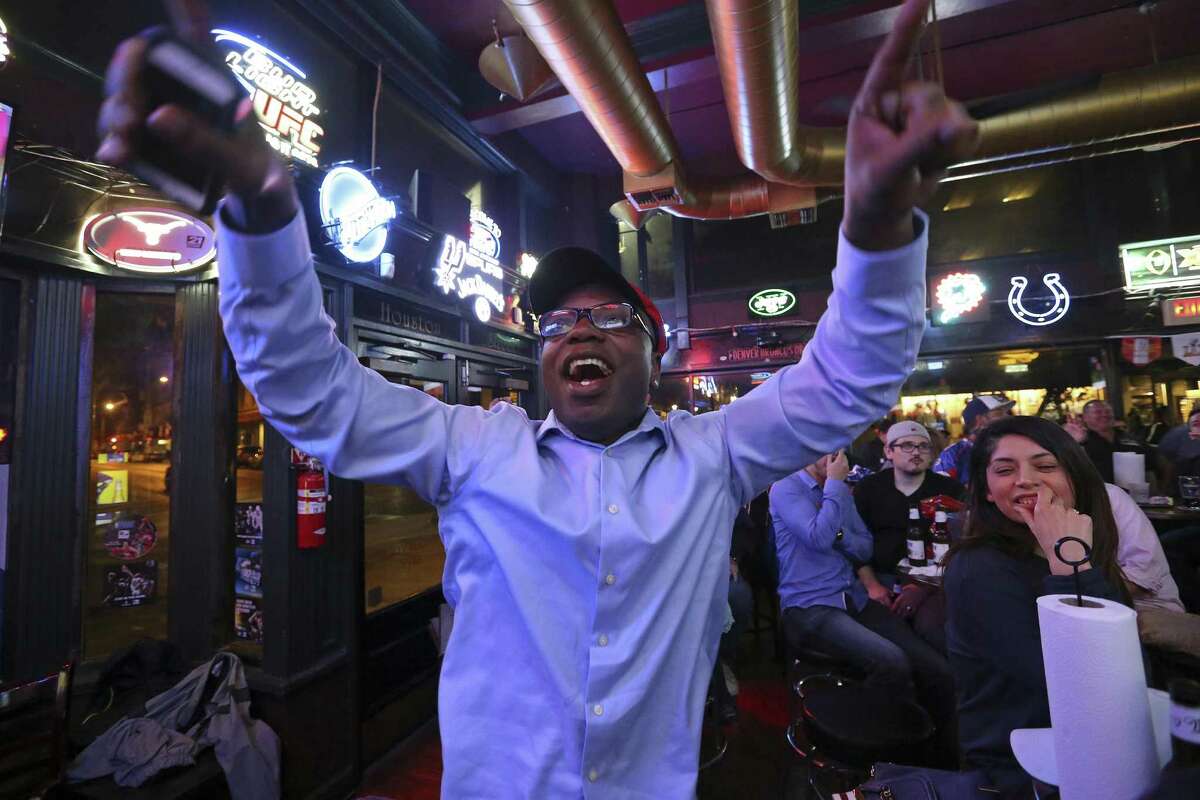 Falcons fan Paul Lamar Hunter, 47 of Racine, WI, cheers for the team while watching the Super Bowl Sunday Feb. 5, 2017 at The Ticket Sports Pub.