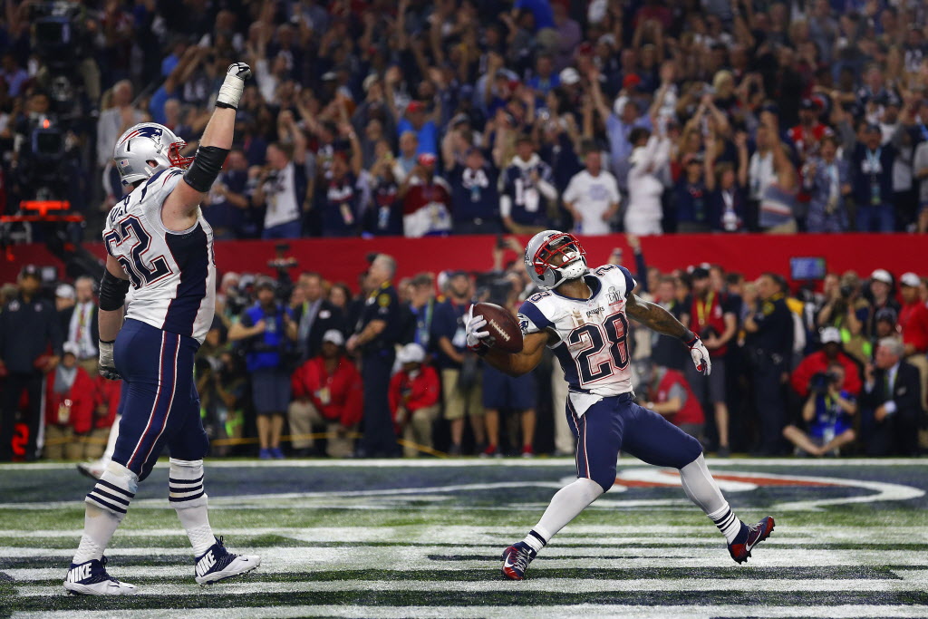 NFL action is seen in a general stadium view from an end zone in the upper  deck of NRG stadium during an NFL football game between the New England  Patriots and the