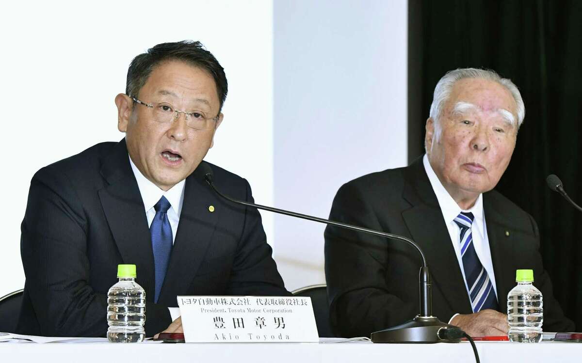 Toyota Motor Corp. President Akio Toyoda (left) speaks with Suzuki Motor Corp. Chairman Osamu Suzuki during an Octomber news conference in Tokyo. Japanese automakers Toyota and Suzuki, which began looking into a partnership in October, say they have decided to work together in ecological and safety technology a rapidly growing area in the industry.