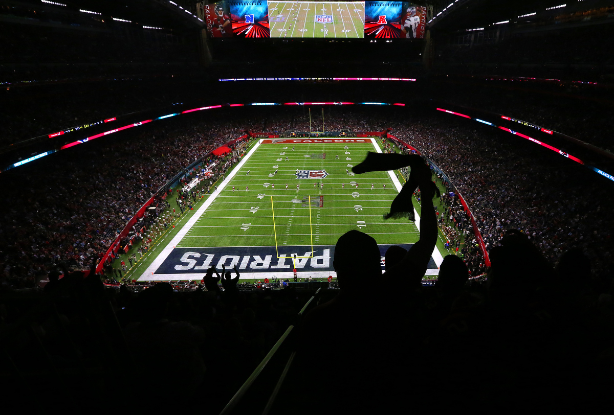 New England Patriots Julian Edelman levitates after catching a Tom Brady  pass for a three yard TD against the Seattle Seahawks in the fourth quarter  of Super Bowl XLIX at University of