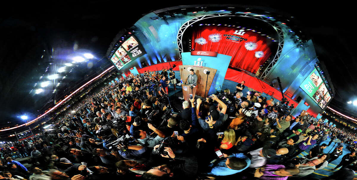 Tom Brady is surrounded by the media during Super Bowl Opening Night at Minute Maid Park, Monday, Jan. 30, 2017, in Houston. This image was made with a 360 degree panoramic camera. ( Mark Mulligan / Houston Chronicle )