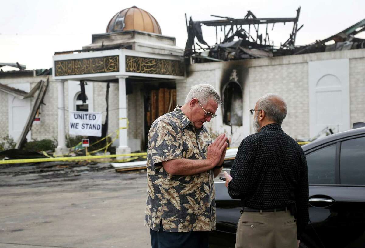 Bill Pozzi, left, who was a district-level delegate to the 2016 Republican National Convention, offers his help and condolences to Shahid Hashmi, the president of the Victoria Islamic Center, Thursday, Feb. 2, 2017, in Victoria. An overnight fire destroyed the center on Jan. 28. ( Jon Shapley / Houston Chronicle )