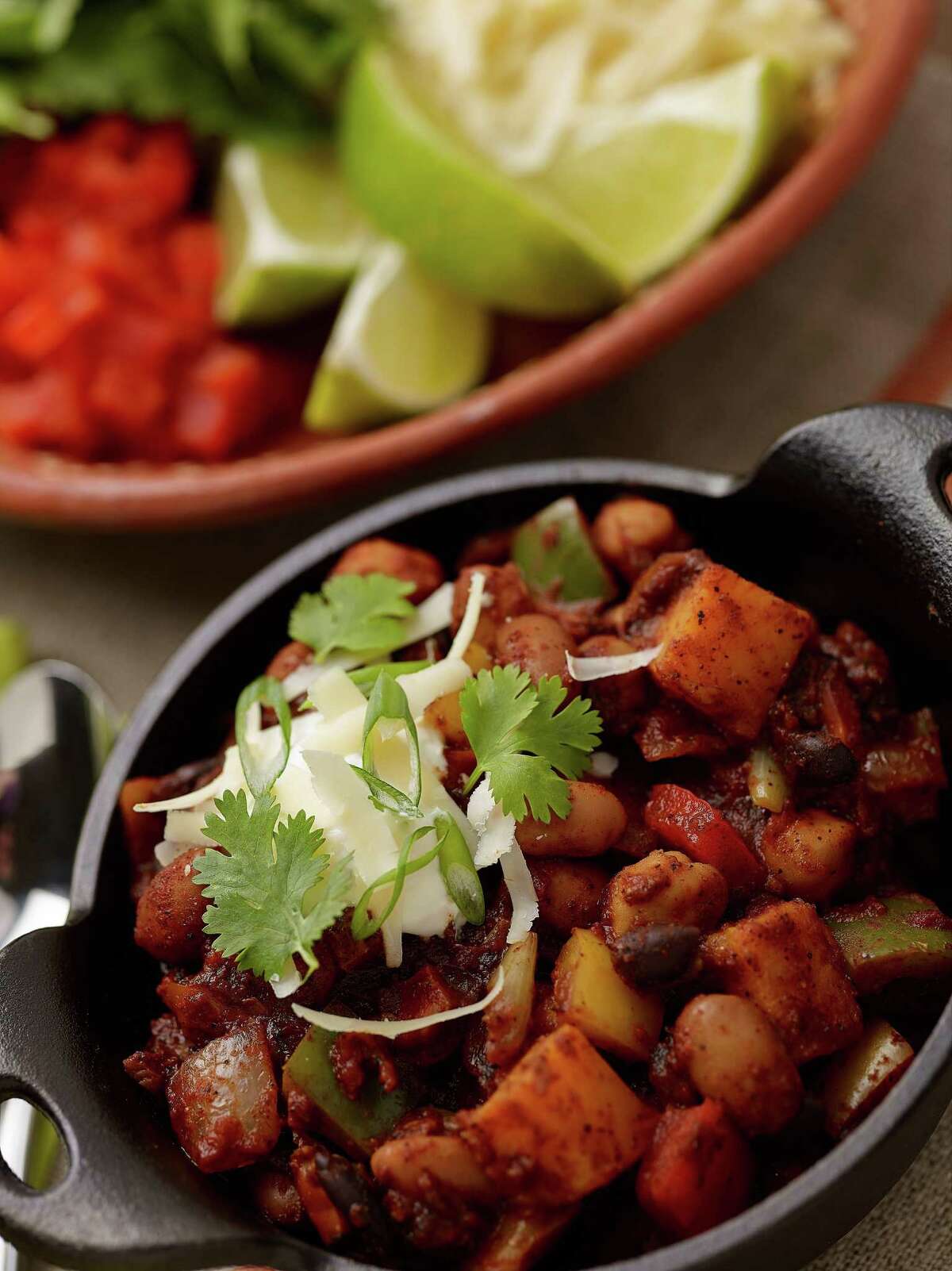 This vegetarian chili makes the most out of squash, black beans, pinto beans and garbanzo beans.
