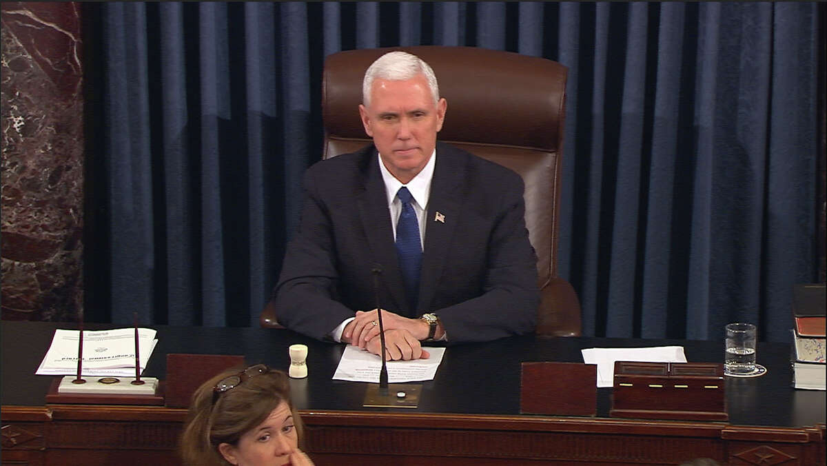 In this image from video, provided by Senate Television shows Vice President Mike Pence presiding over the Senate on Capitol Hill in Washington, Tuesday, Feb. 7, 2017, during the Senate's vote on Education Secretary-designate Betsy DeVos. The Senate confirmed DeVos with Pence breaking a 50-50 tie. (Senate Television via AP)