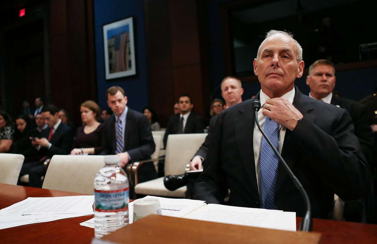WASHINGTON, DC - FEBRUARY 07: Homeland Security Secretary John Kelly (R) prepares to testify to the House Committee On Border Security on Capitol Hill on February 7, 2017 in Washington, D.C. Kelly spoke about border security and President Trump's recent travel ban. (Photo by Mario Tama/Getty Images)