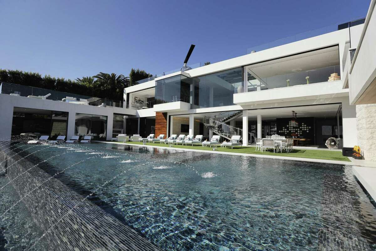 This $250 million mansion in the Bel-Air neighborhood of Los Angeles features a 85-foot infinity swimming pool. Reams of data have shown that in recent decades the rich have been taking ever-larger shares of wealth and income — especially in the U.S., where corporate profits are nearing records while wages for the workforce remain stagnant.