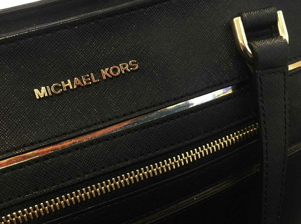 Luxury sector pain spreads; Michael Kors sees weakness ahead