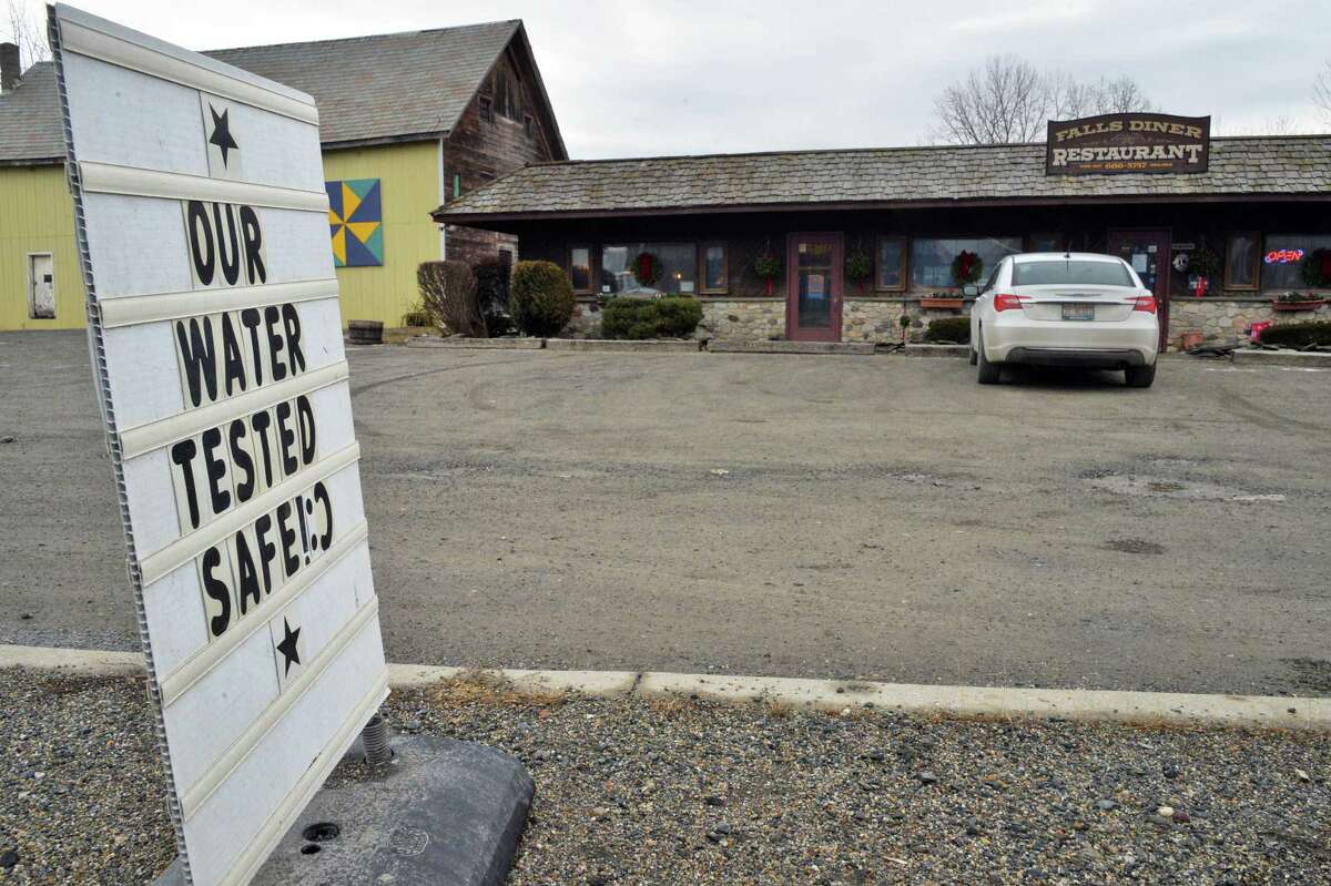 Sign in front of the Falls Diner restaurant Tuesday Jan. 26, 2016 in Hoosick Falls, NY. A Health Department report said levels of PFOA that are considered safe for human consumption were found in several private wells, including at the Falls Diner restaurant on Route 22. (John Carl D'Annibale / Times Union)