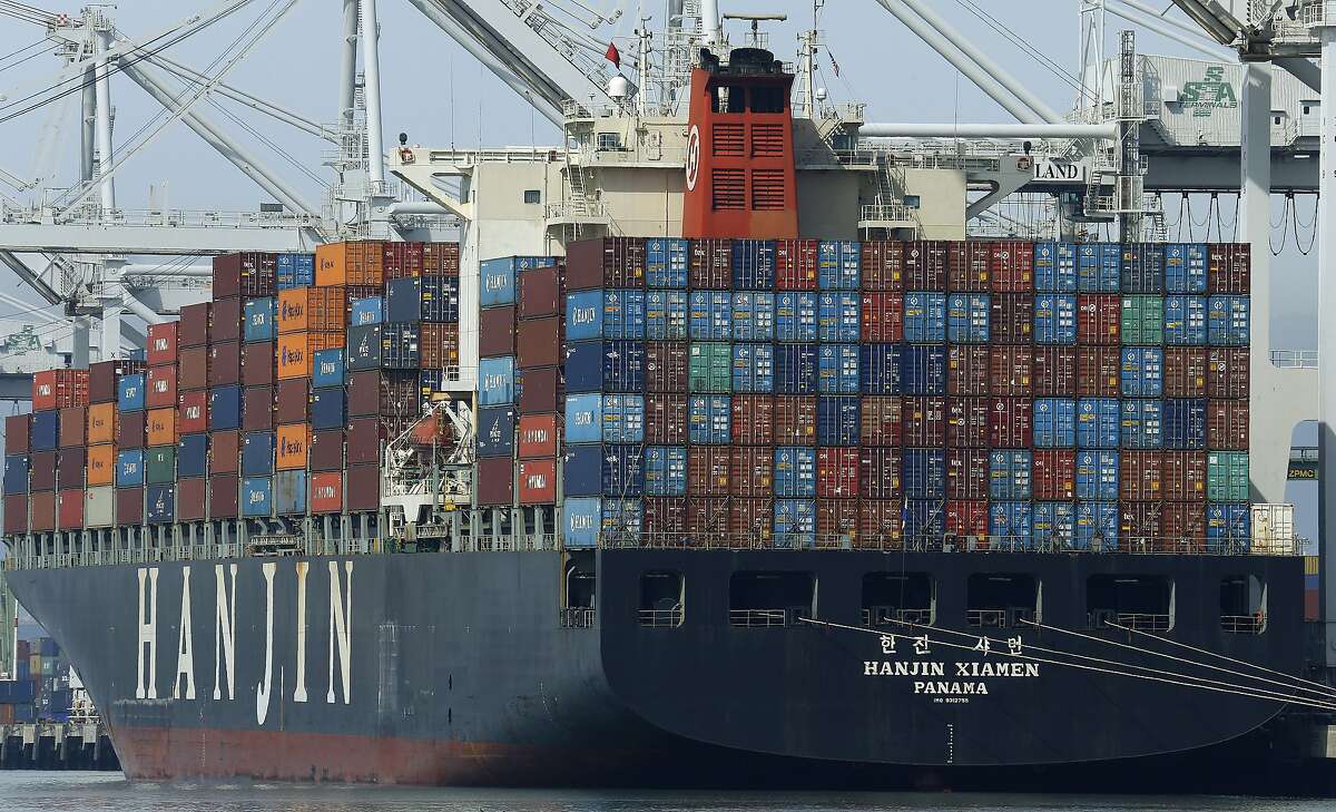 FILE - In this March 2, 2016, photo, the container ship Hanjin Xiamen waits to be unloaded at the Port of Oakland, in Oakland, Calif.