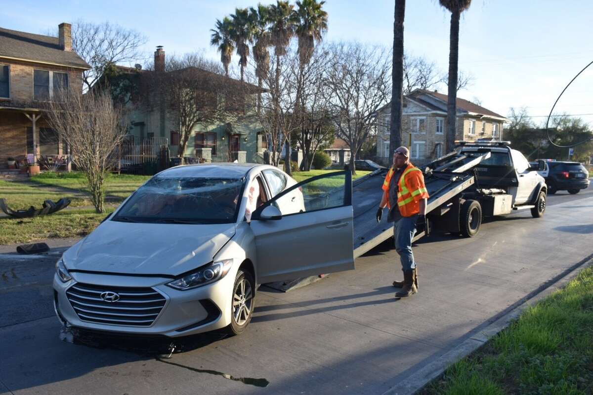A hit and run caused a rollover at the intersection of Woodlawn Avenue and Calaveras Street on Wednesday, Feb. 8, 2017. A driver hit a mother and daughter in their car on their way to school and then fled the scene.