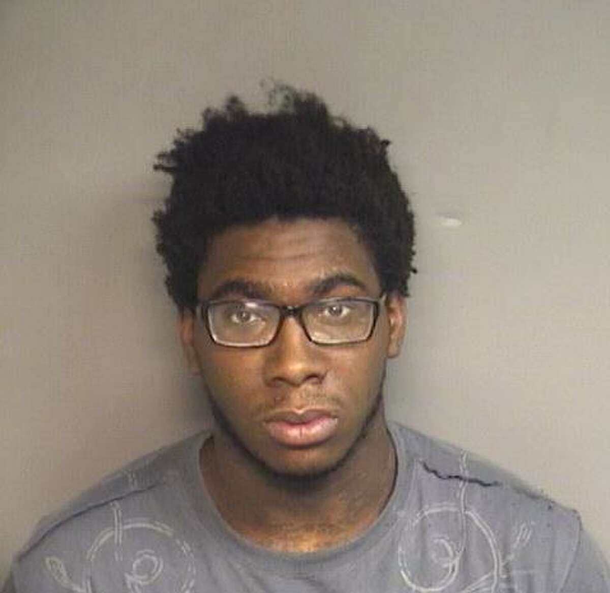 Isiah Whyte, 19, of Stamford, was charged with using a bat to smash the glass front door of Boost Mobile cell phone store on West Main Street early Wednesday morning.