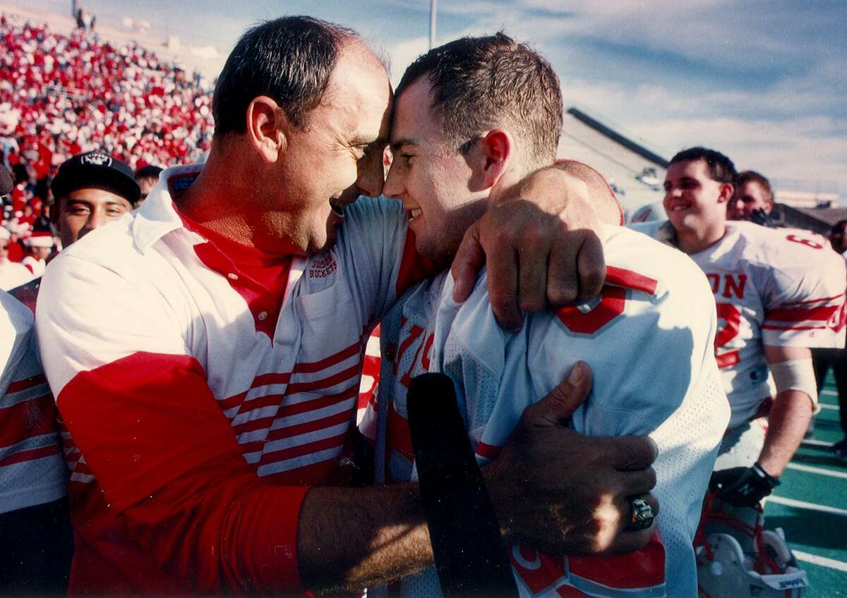 Judson coach D.W. Rutledge hugs his son Clint Rutledge, quarterback for the team, after the Rockets beat Plano Wildcats for a state title in Waco in 1993.