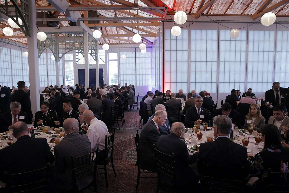 Guests, including California Governor Jerry Brown, seated center, during a fundraising luncheon for Oakland Military Institute charter school at Scott's Seafood Restaurant in Oakland, Calif., on Thursday, February 9, 2017. The restaurant's owner, Ray Gallagher, has been fined $395,000 by the San Francisco Bay Conservation and Development Commission for having erected the pavilion in which the luncheon was held.