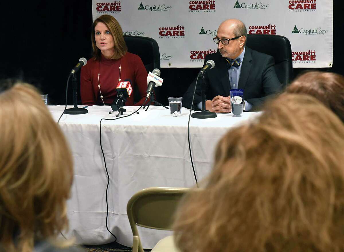 Joan Regan Hayner, CEO of CapitalCare Medical Group, LLC, left, and Shirish Parikh, CEO of Community Care Physicians, P.C., hold a press conference to announce their intent to consolidate on Friday, Feb. 10, 2017 in Albany, N.Y. (Lori Van Buren / Times Union)