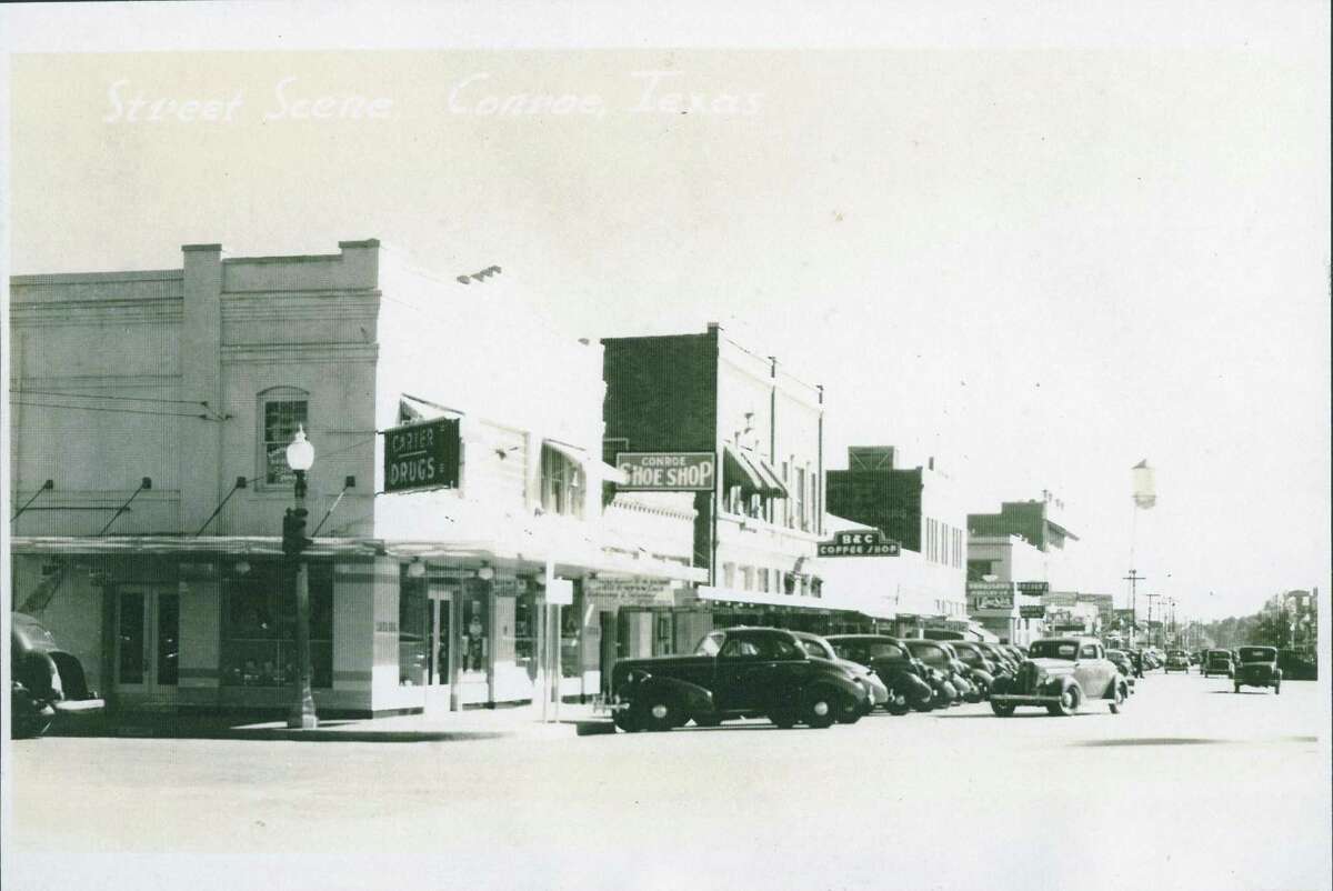 Carter Drug Store is pictured at Main and Davis streets in downtown Conroe. Its owners Robin and Hattie Carter lived nearby in a home at 402 West Phillips in Conroe. County officials and local historians are hoping someone will come forward to move the home.