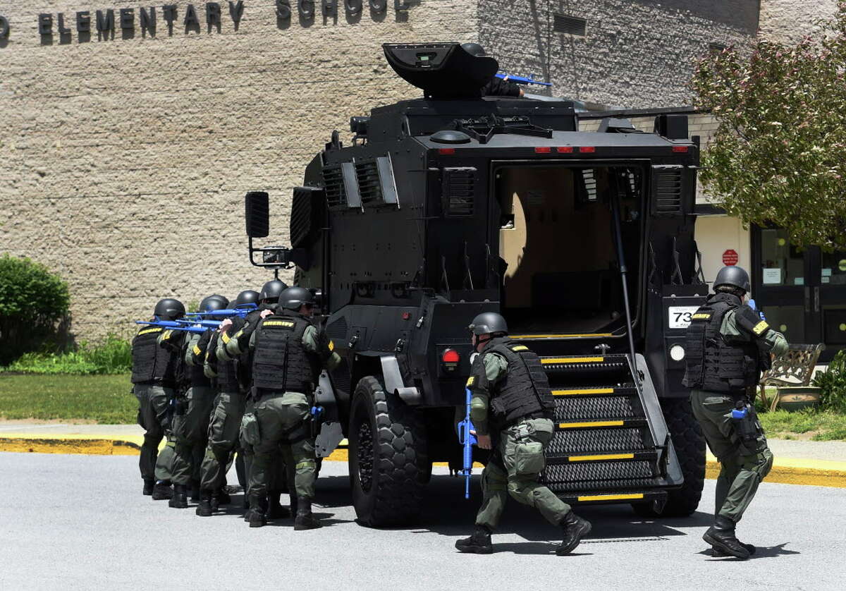 Nine SWAT teams, 131 tactical officers, cost unknown