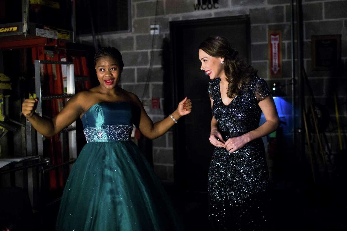 The Eleanor McCollum Competition for Young Singers finalists Siphokazi Moltena, left, and Anne Marie Stanley, right, do a victory dance after they performed at the Concert of Arias, the final round of the youth competition, Friday, Jan. 27, 2017, in Houston. ( Marie D. De Jesus / Houston Chronicle )