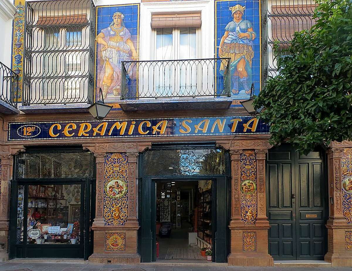 In Sevilla's Triana district, vintage storefronts proudly display the neighborhood's ceramic heritage.