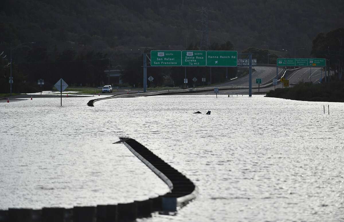 A flooded section of Highway 37 is seen in Novato, California on February 10, 2017. The road has been closed at least 14 days this winter due to flooding and extensive rain.